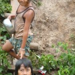 Children on the riverside in Battambang